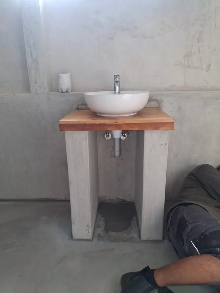 Counter-top basin, mixer and bottle trap installed on a new vanity